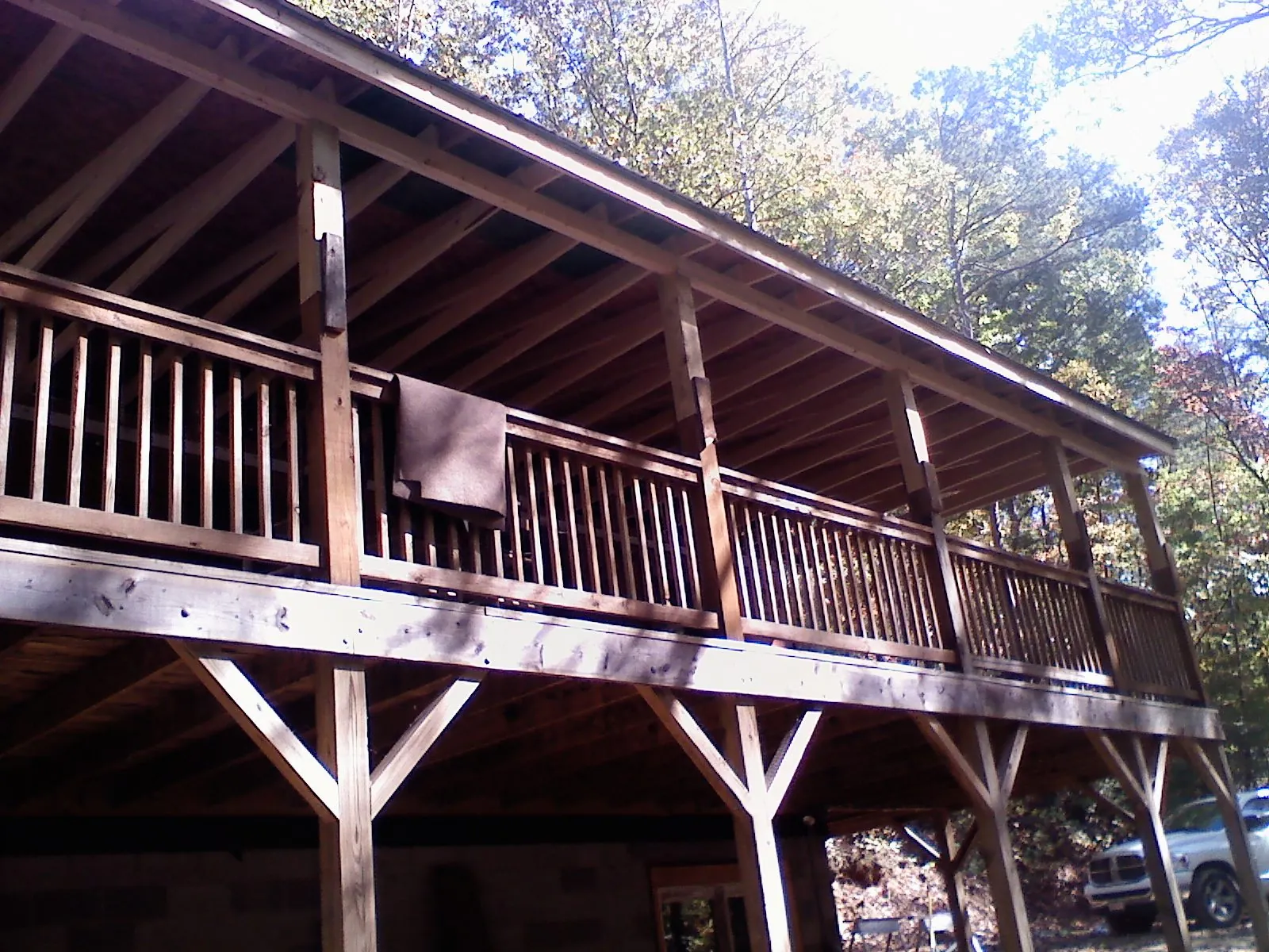 Timber framing under a new elevated porch and deck — Roof Leak Repair in Sylva by Roofing Brothers
